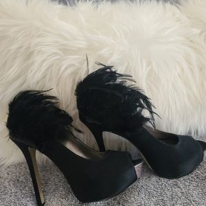 ENZO ANGIOLINI pump. Size 7 M. Open toe, metallic front, and black satin finish